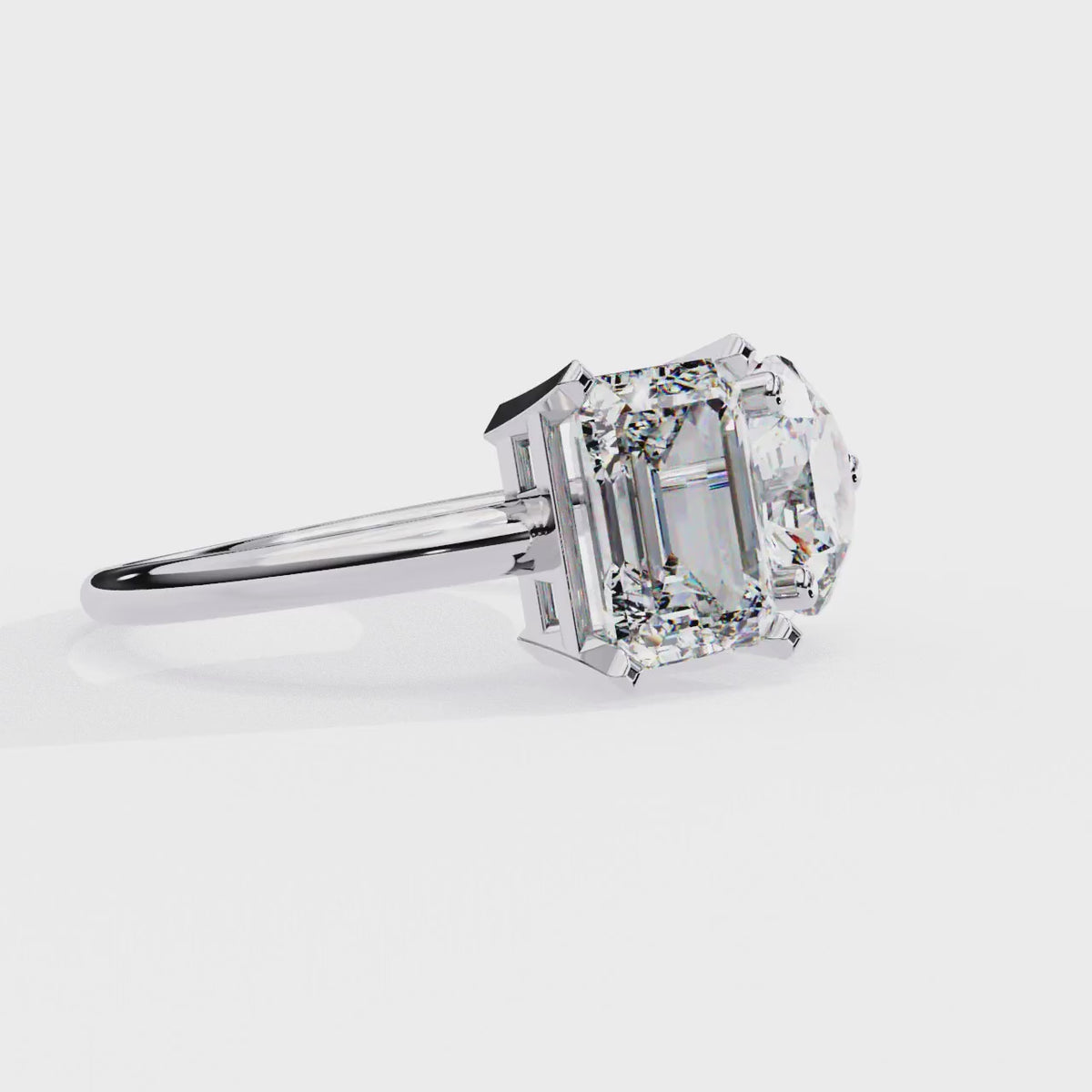 White Gold Toi et Moi Emerald and Round Cut Two Stone Diamond Ring