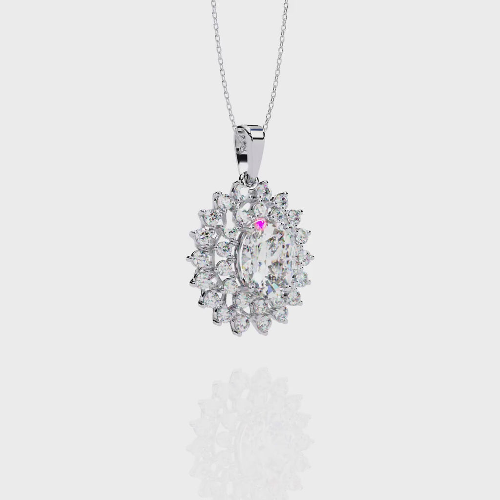 Elegant oval and round diamond pendant