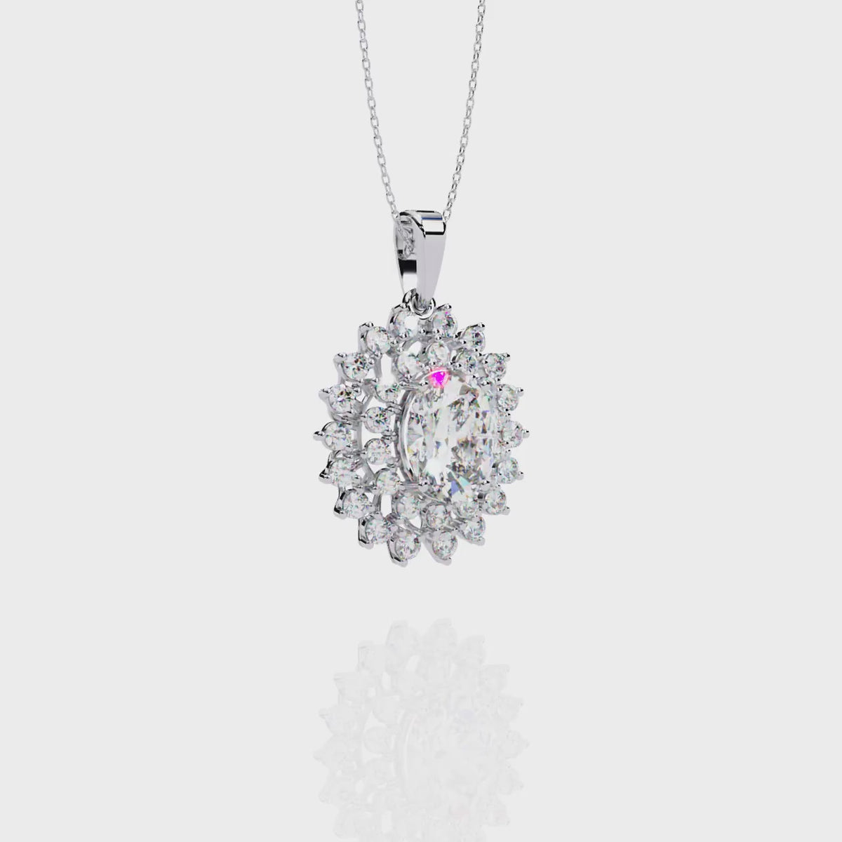 Elegant oval and round diamond pendant