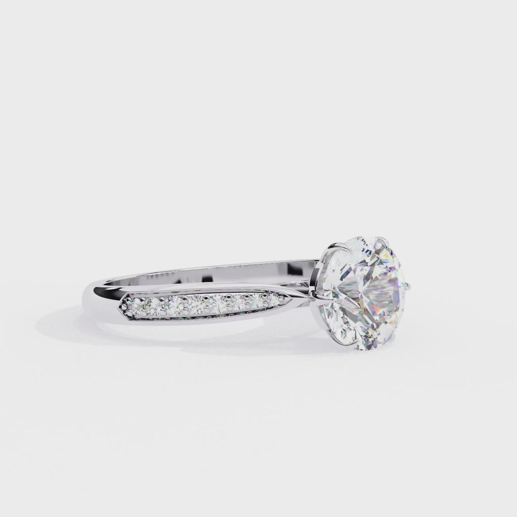White Gold Round Brilliant Diamond Ring with Channel Pavé Shoulders