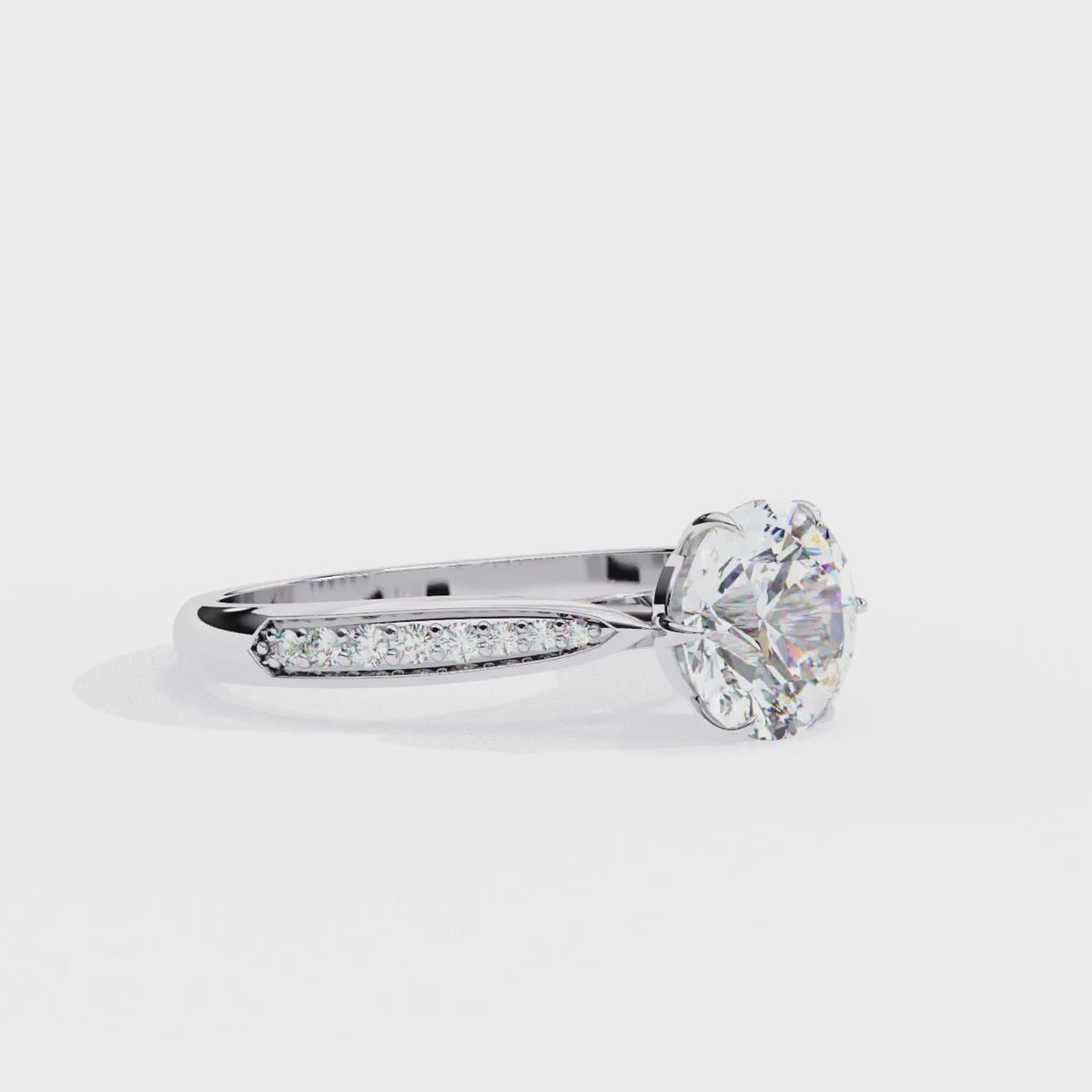 White Gold Round Brilliant Diamond Ring with Channel Pavé Shoulders