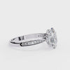 White Gold Oval Cut Diamond Ring with Channel-Framed Pavé Shoulders