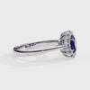 White Gold Oval Blue Sapphire Ring with Diamond Halo